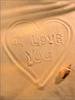 I Love U written in the sand